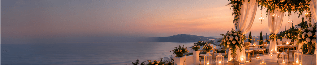 Candle-lit wedding terrace overlooking the sea at sunset